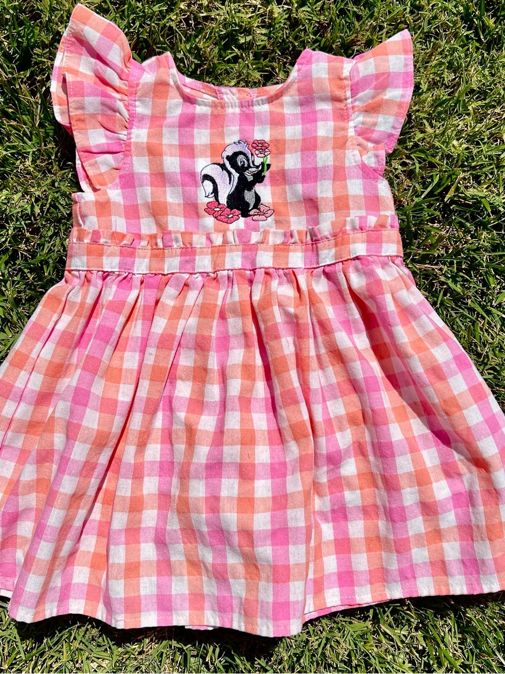 Girls Pink & Peach Gingham Dress with Skunk Embroidery from Bambi